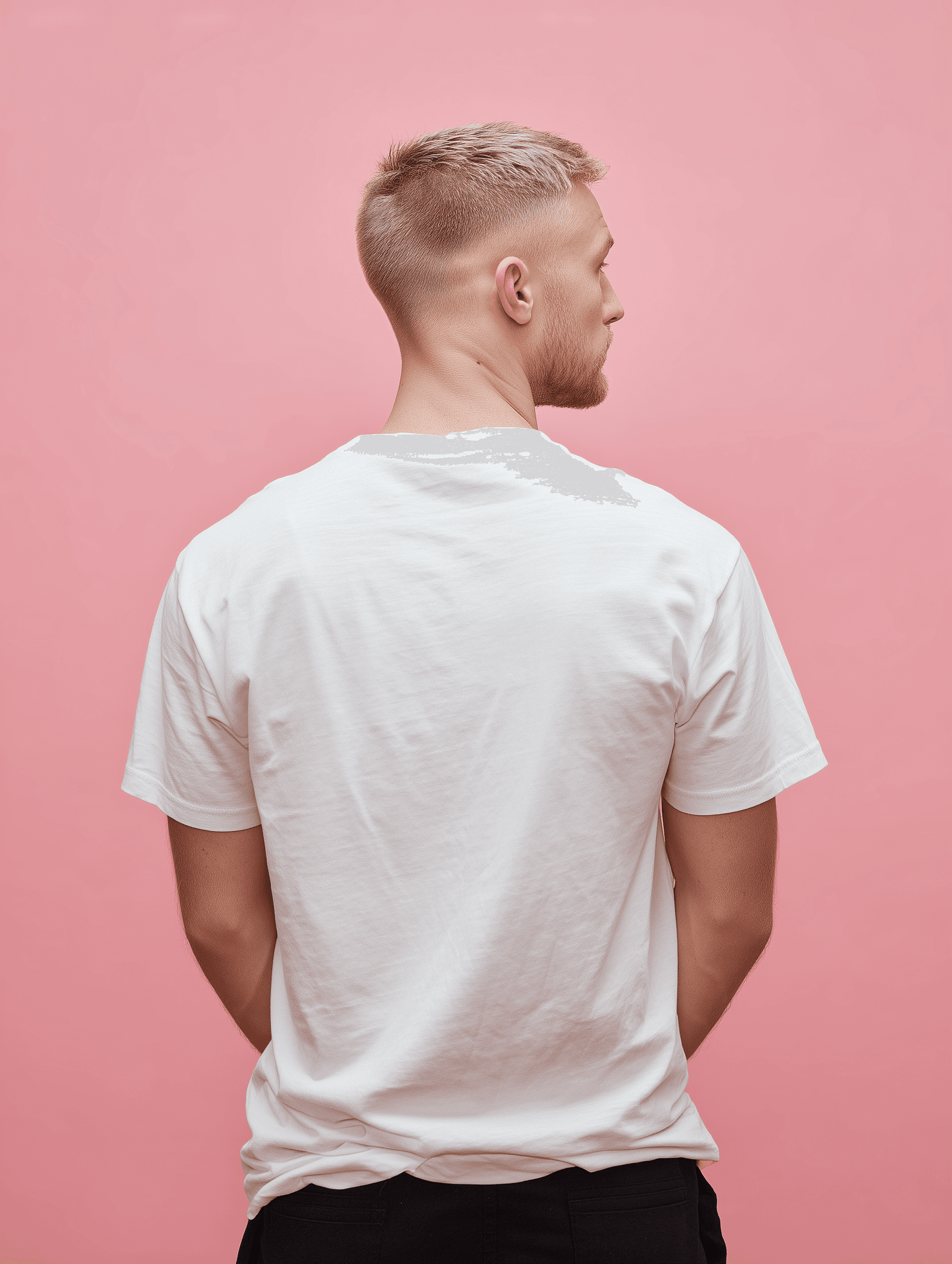 Man in pink background with white shirt