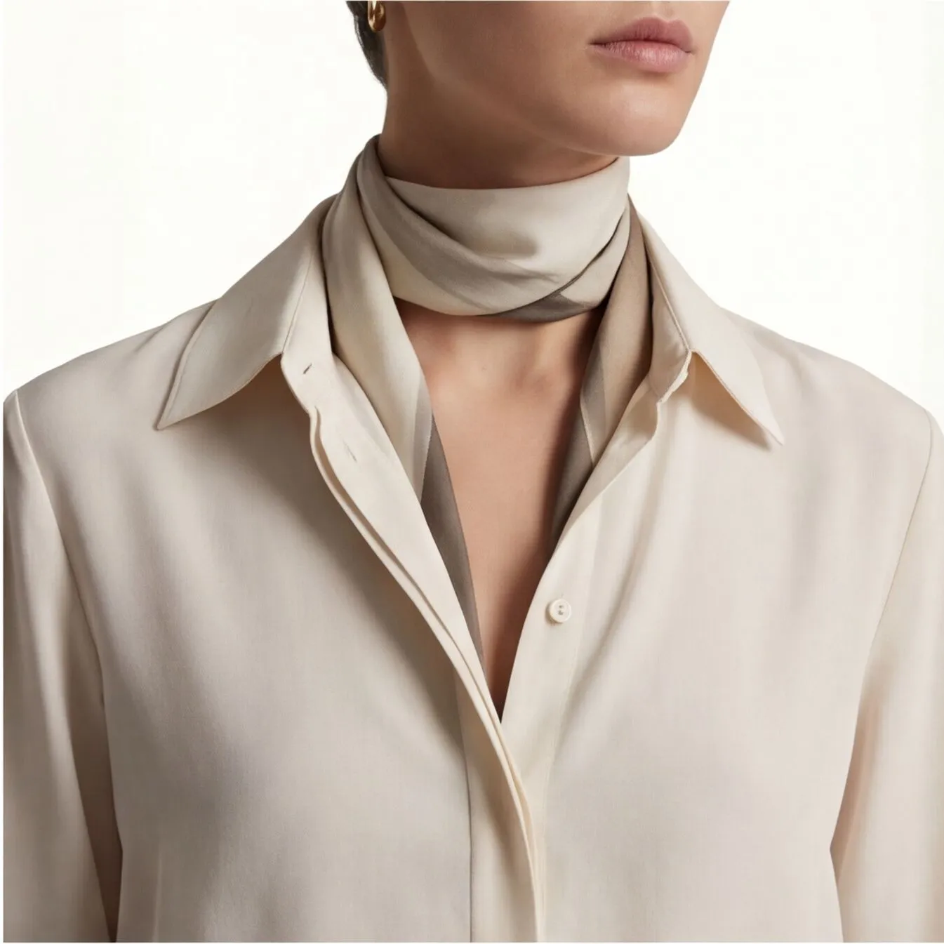 Classic leather-strap watch on a blazer cuff, consistent catalog styling