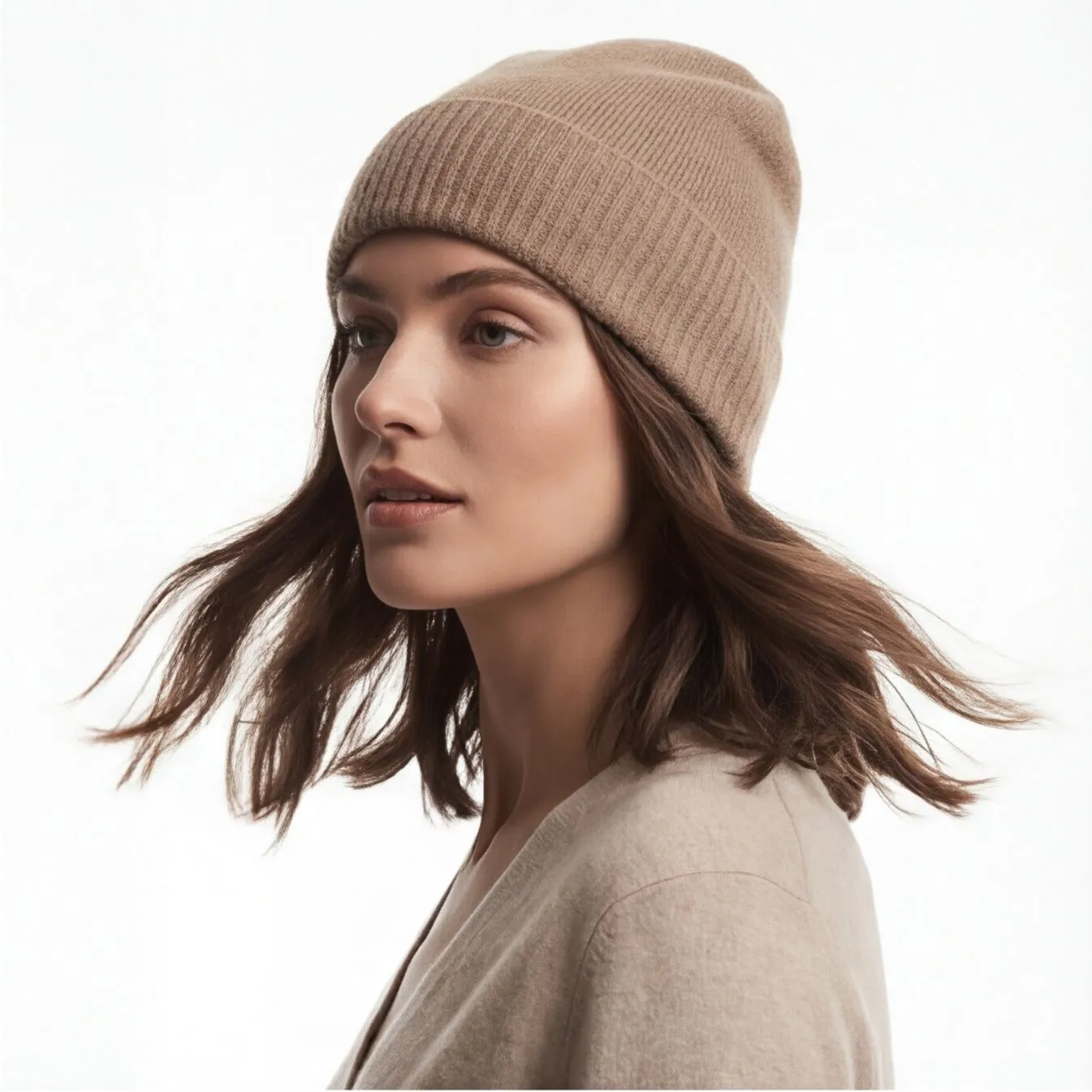 Cashmere beanie on a model in profile view, consistent catalog styling