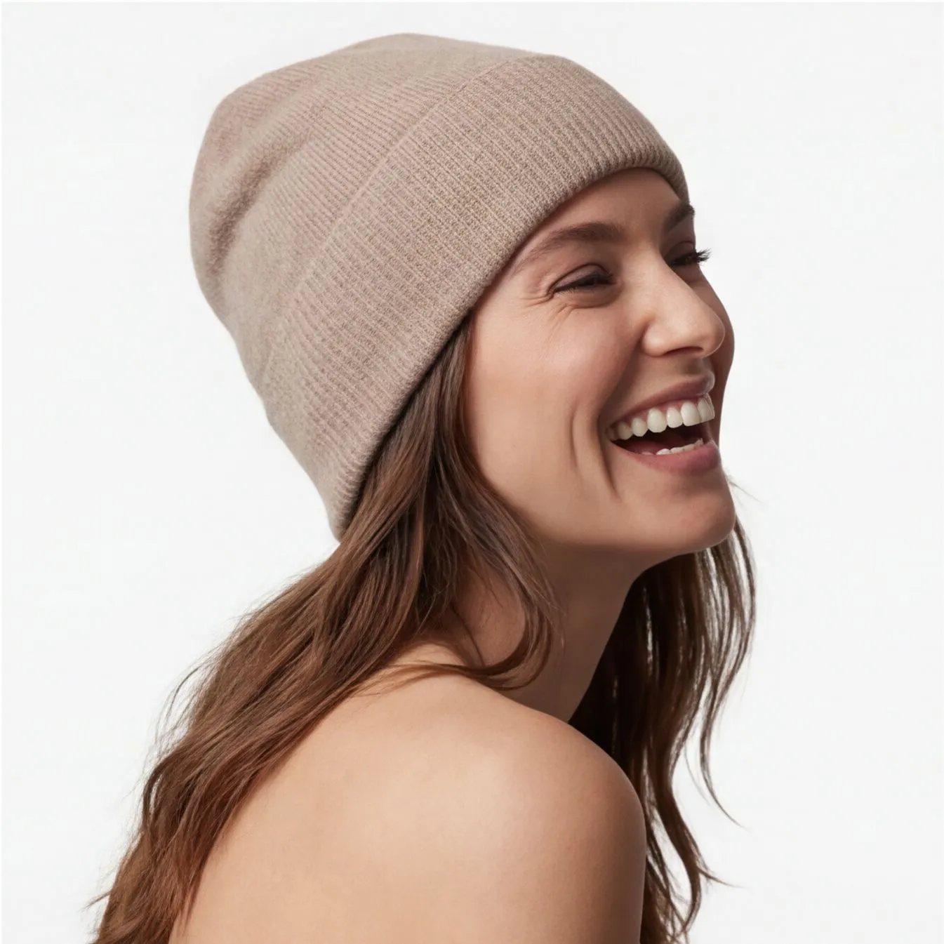 Beige cashmere beanie on a laughing model, consistent catalog styling