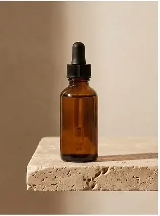 Amber bottle on travertine