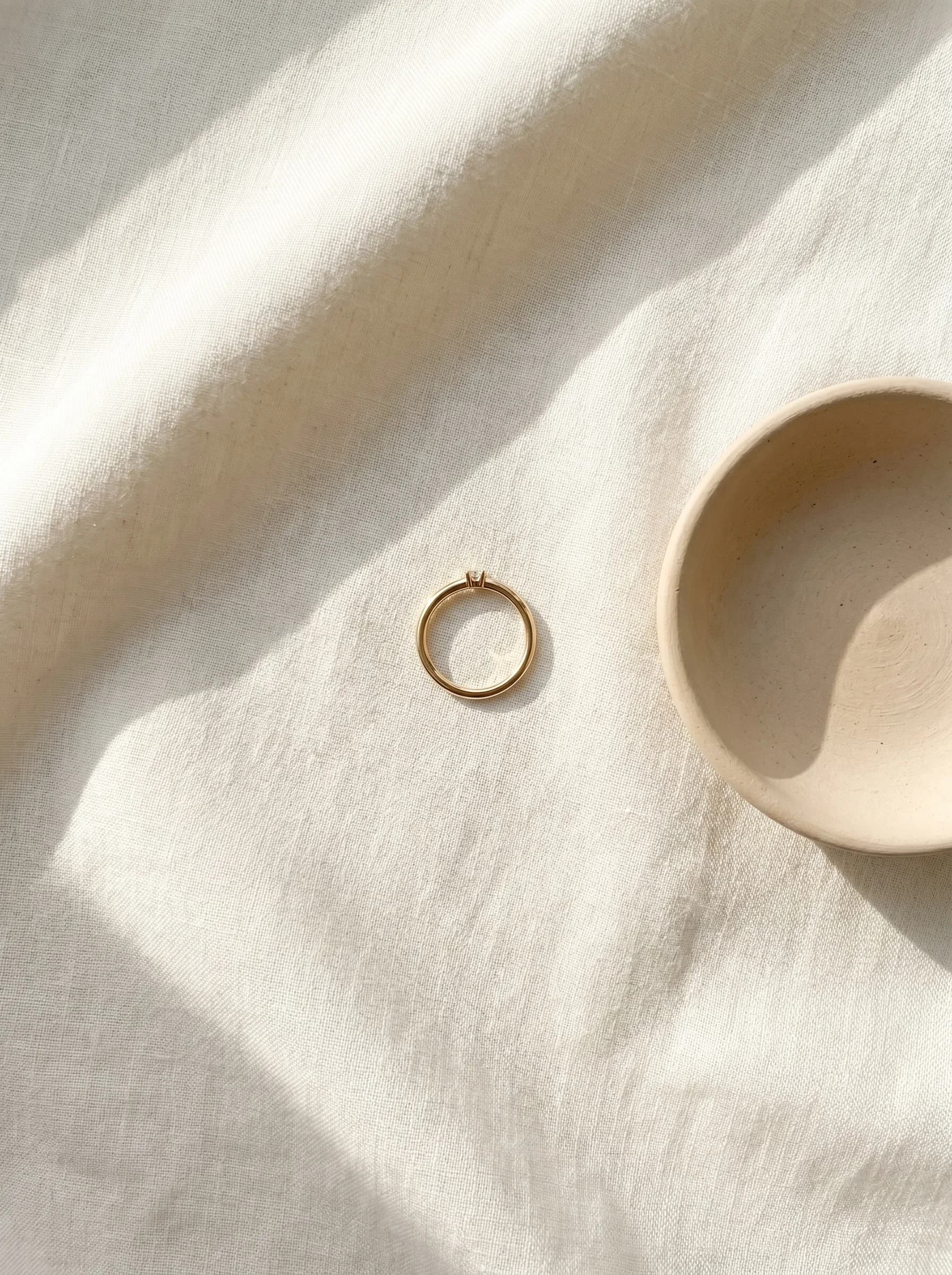 A gold ring photographed in the Overhead composition