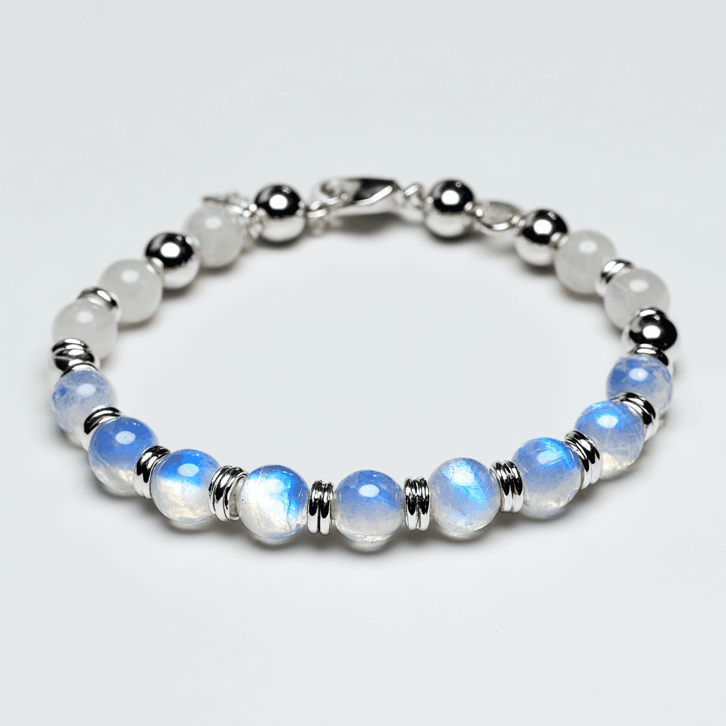 Clean product photography of silver and blue beaded bracelet on white background